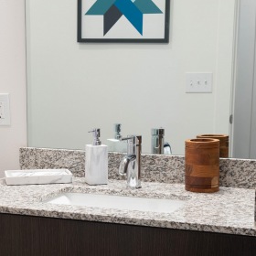 Bathroom well lit vanity in bathroom in lagrange apartments
