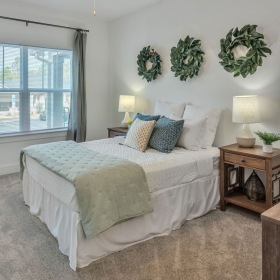 Bedroom with natural lighting and high ceilings Bedroom with natural lighting and high ceilings